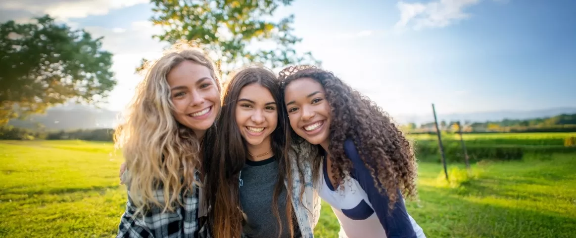 Happy teenagers outside